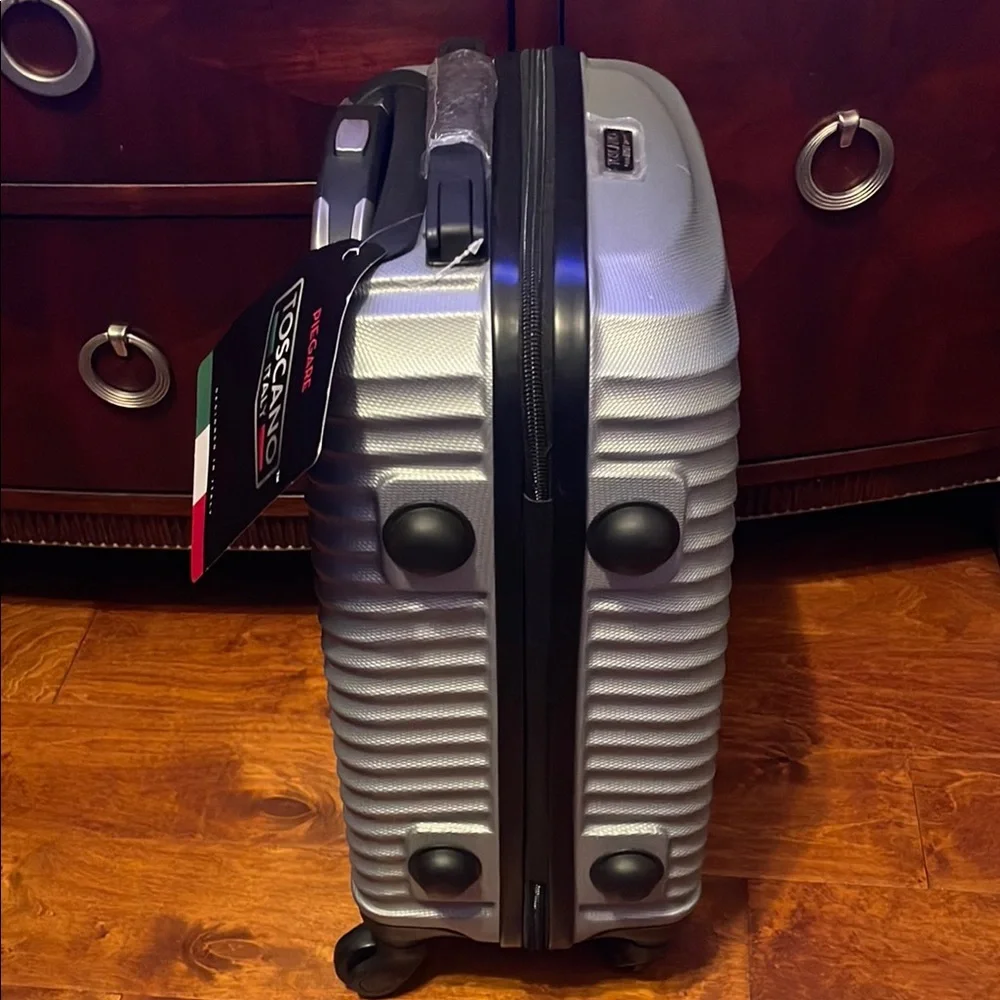 Silver and Black Cylindrical Storage Container with Wheels